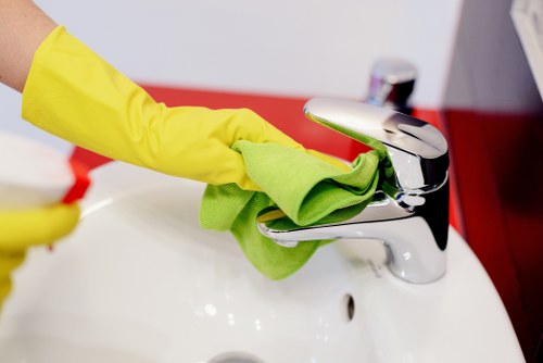 Cleaner moving household items safely during a cleaning task
