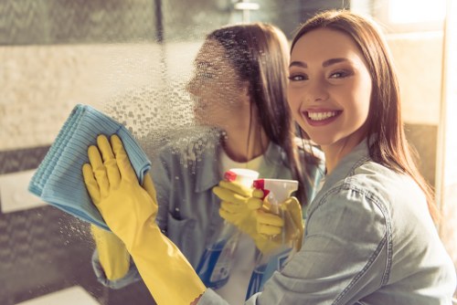 Local cleaning service preparing a London property for regular housekeeping